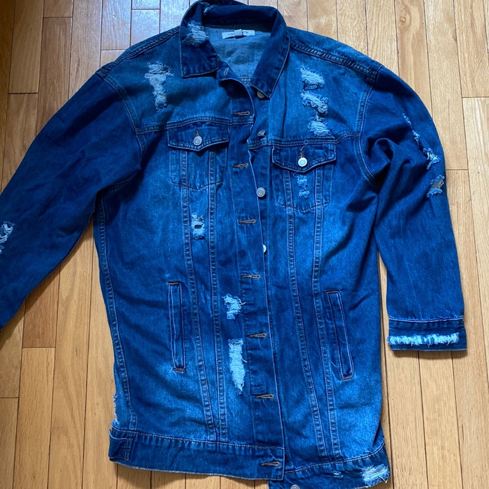 Size small oversized long distressed denim jacket.